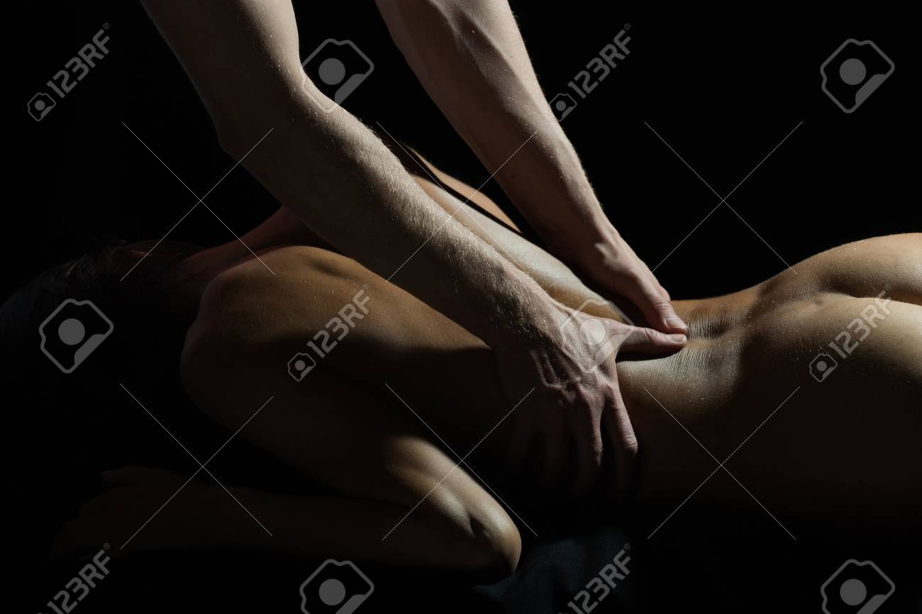 Man and woman erotic massage