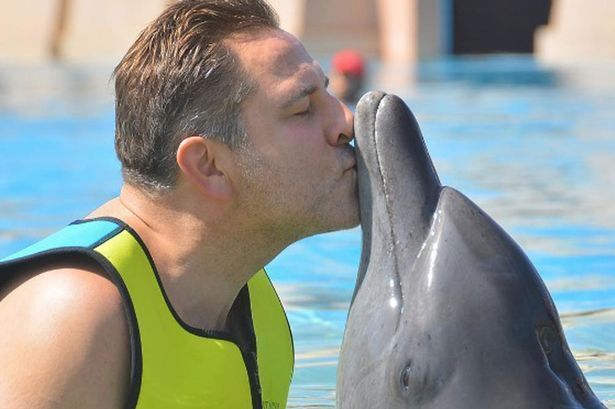Dolphin trainer oral sex dolfin