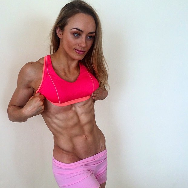 Athletic girls with six pack abs