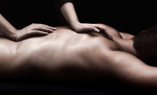 Man and woman erotic massage