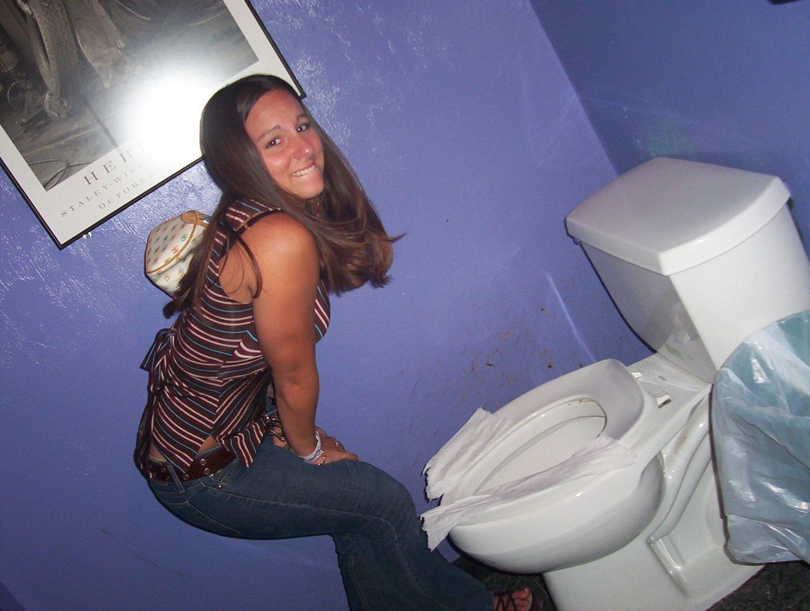 Toilet desperation peeing her pants