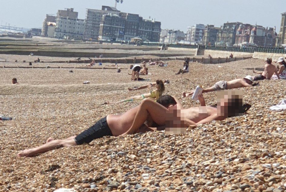 Family nudists on the beach