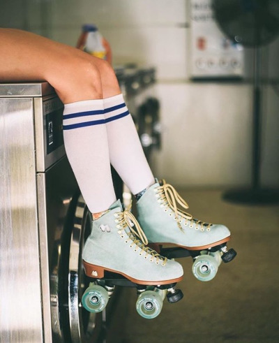 Girls in socks and roller skates