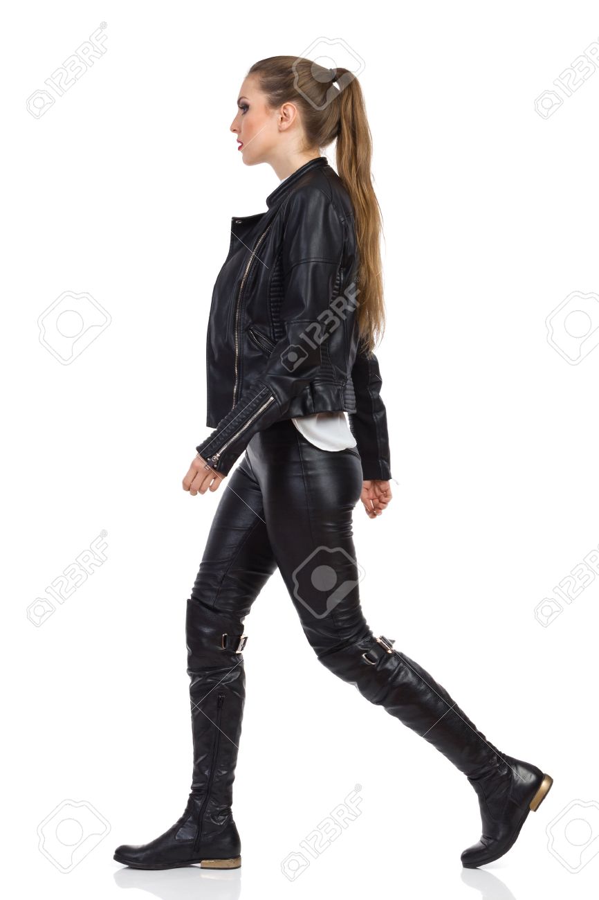 Woman in black leather boots