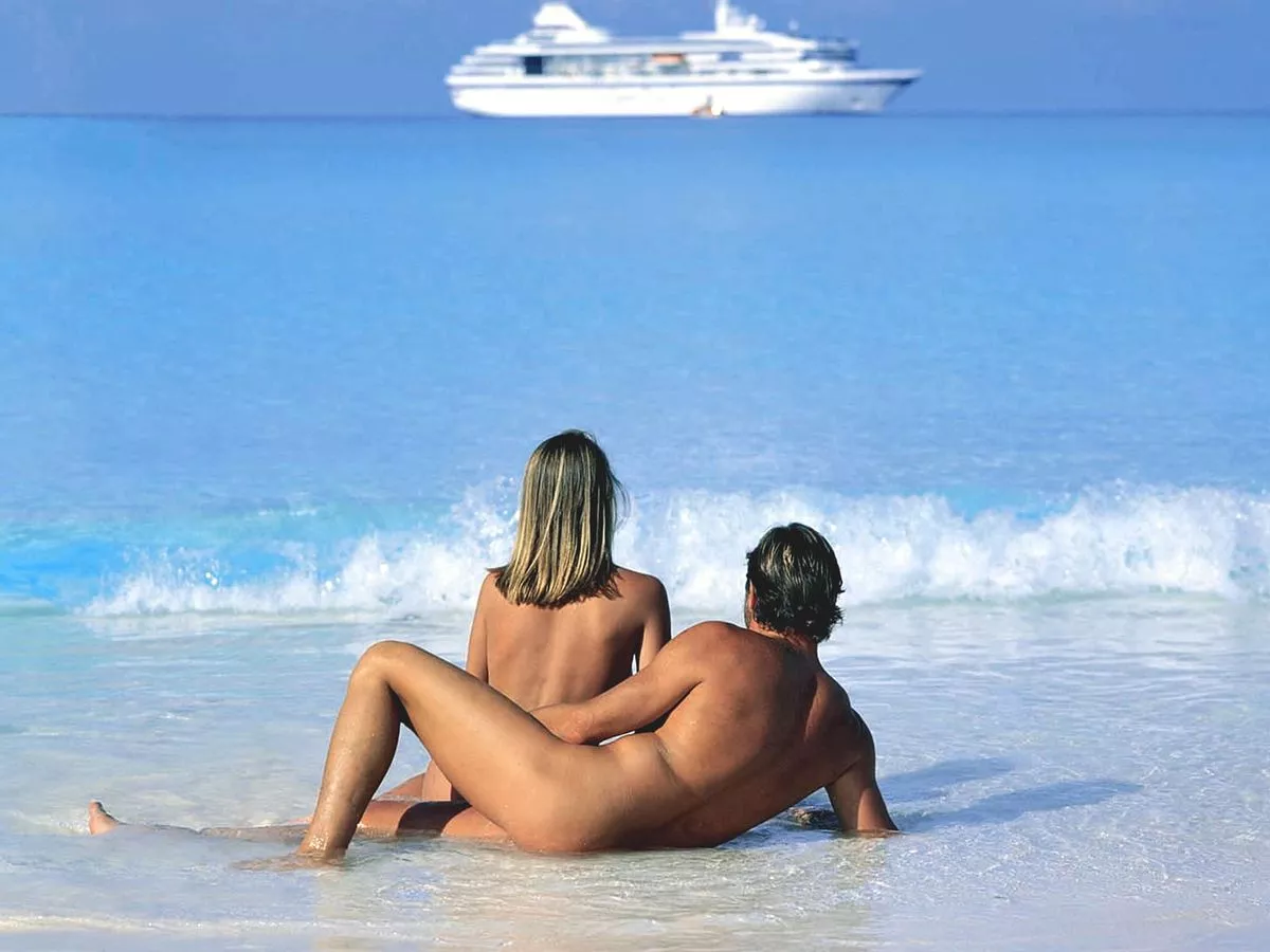 Family nudists on the beach